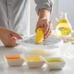 4-IN-1 Multi Grater with case and plastic cover for slicing, shredding, and grating