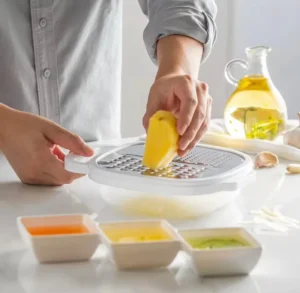 4-IN-1 Multi Grater with case and plastic cover for slicing, shredding, and grating