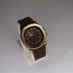 Brown leather strap watch for men with gold dial and round case