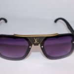 Louis Vuitton sunglasses with gold frame and purple gradient lenses