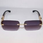 Rimless square sunglasses with gold frame and gradient lenses