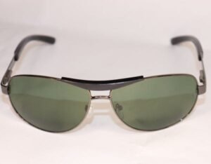 Aviator sunglasses with green lenses and metal frame