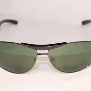 Aviator sunglasses with green lenses and metal frame