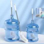 Water Bottle Cleaning Brush cleaning the neck and bottom of a large water dispenser bottle