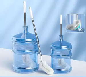 Water Bottle Cleaning Brush cleaning the neck and bottom of a large water dispenser bottle